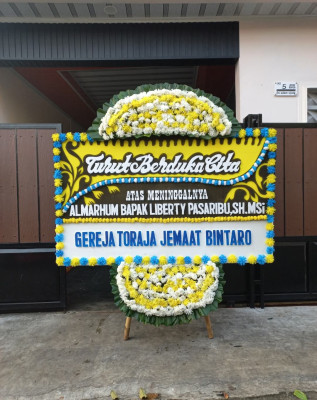 Papan Bunga Duka di Tarogong Kaler